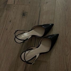 stuart Weitzman - sling back pointed toe - black kitten heel